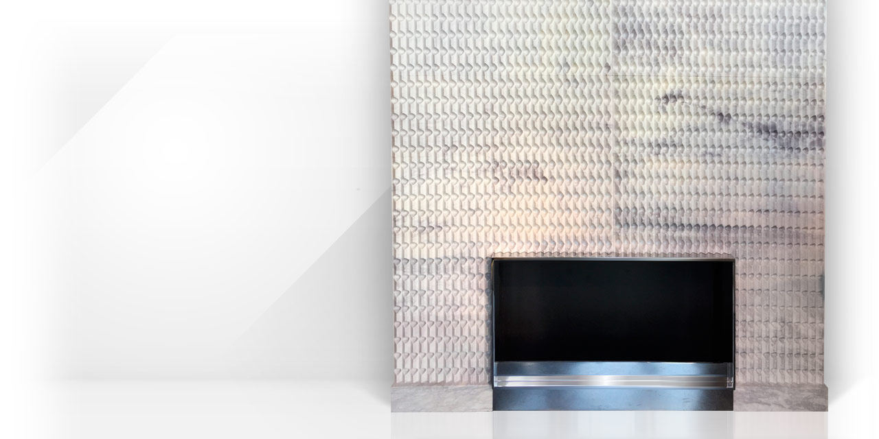 La cheminée en marbre Origami est une création originale aux lignes modernes et minimalistes, fruit de la collaboration entre les architectes Bismut & Bismut, et Maison & Maison